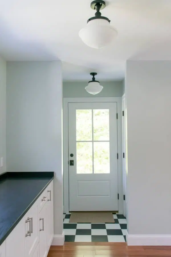 Butler's pantry with view to mudroom and two repeated schoolhouse lights.