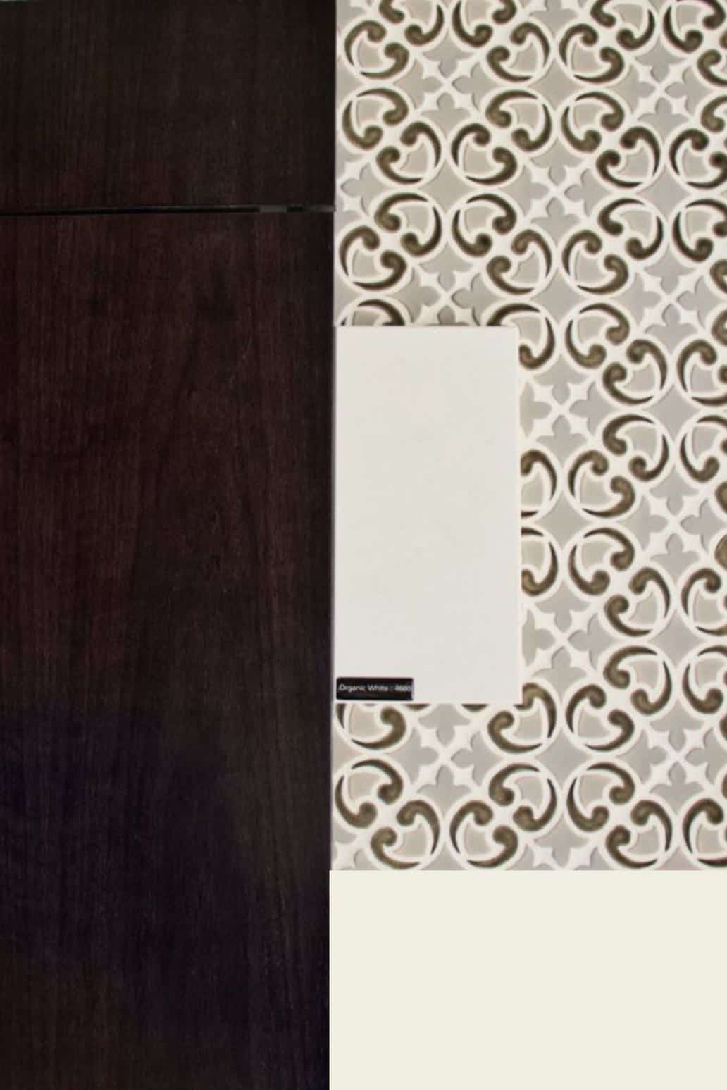 Dark Walnut cabinet with white counter and Julep Tile mosaic backsplash.
