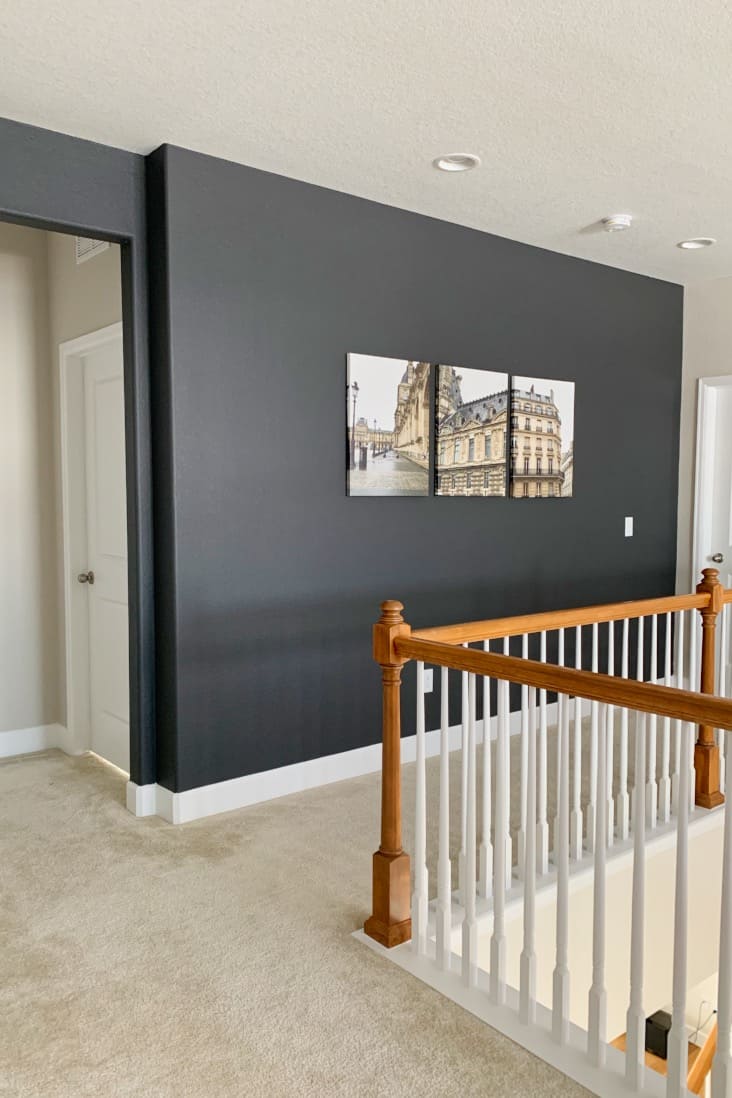 Black accent wall painted with Sherwin-Williams Iron Ore