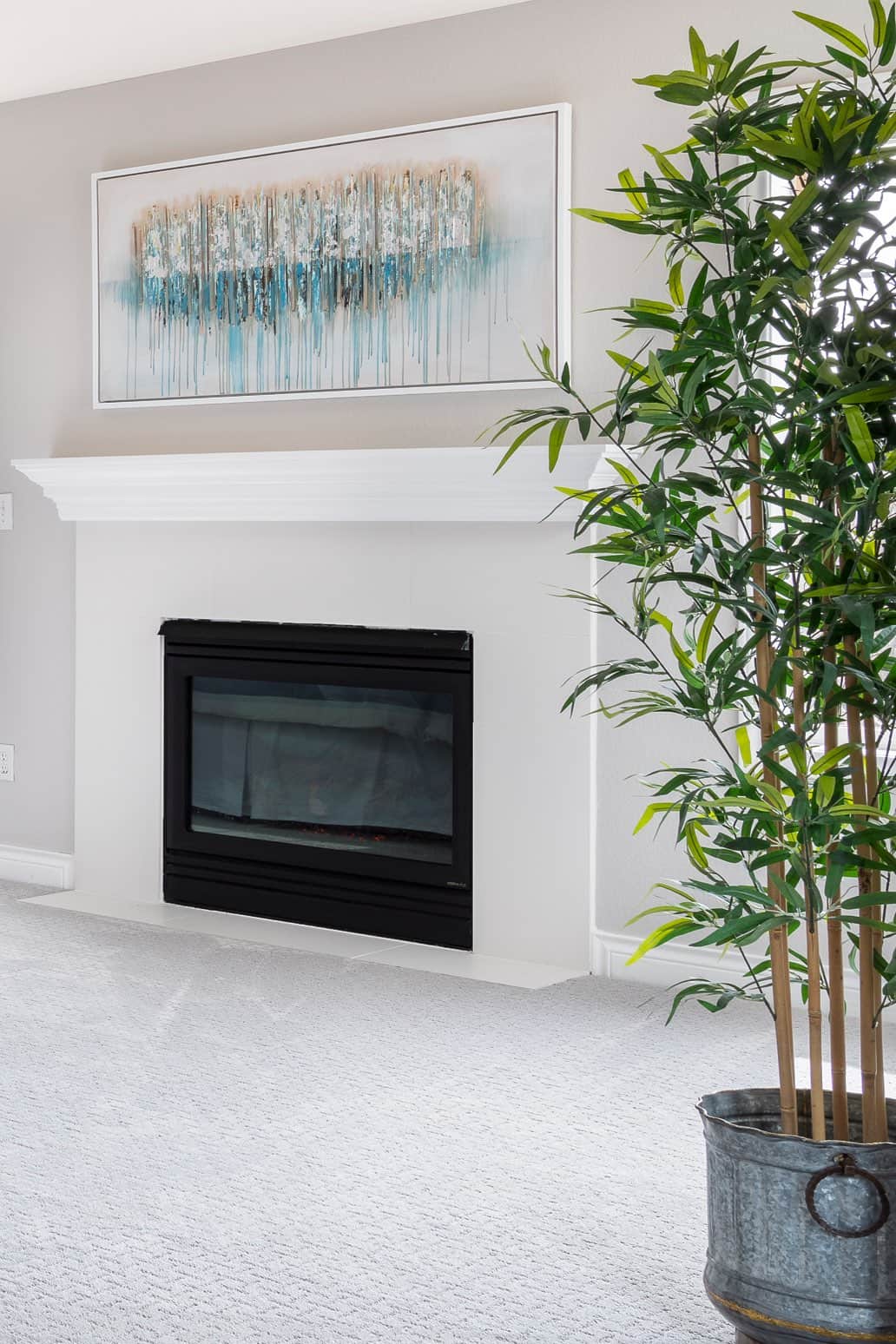 Classic fireplace mantle with white tile