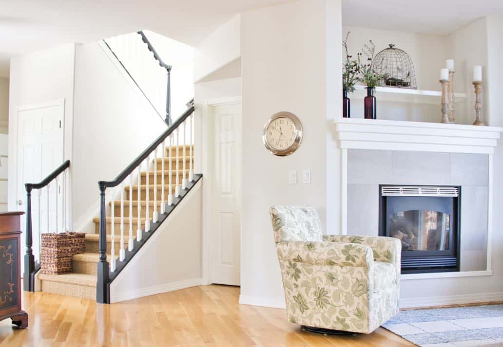 A living room and stairway painted with BM Classic Gray paint.