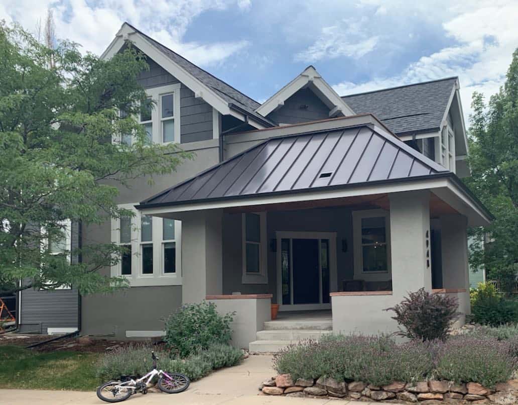 Classic house with front porch, Rockport Gray stucco, Kendall Charcoal siding and Classic Gray trim.