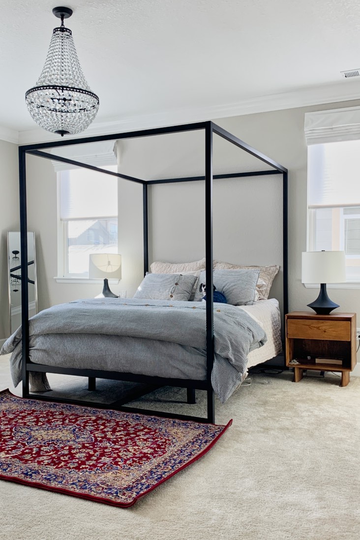 Master suite with walls painted Agreeable Gray walls and Pottery Barn Mia Chandelier