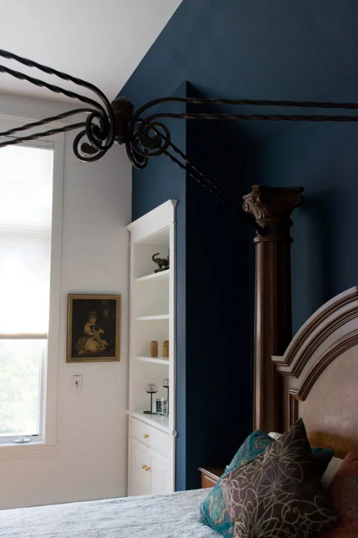 Master bedroom with Extra White walls and BM Gentleman's Gray headboard accent wall.