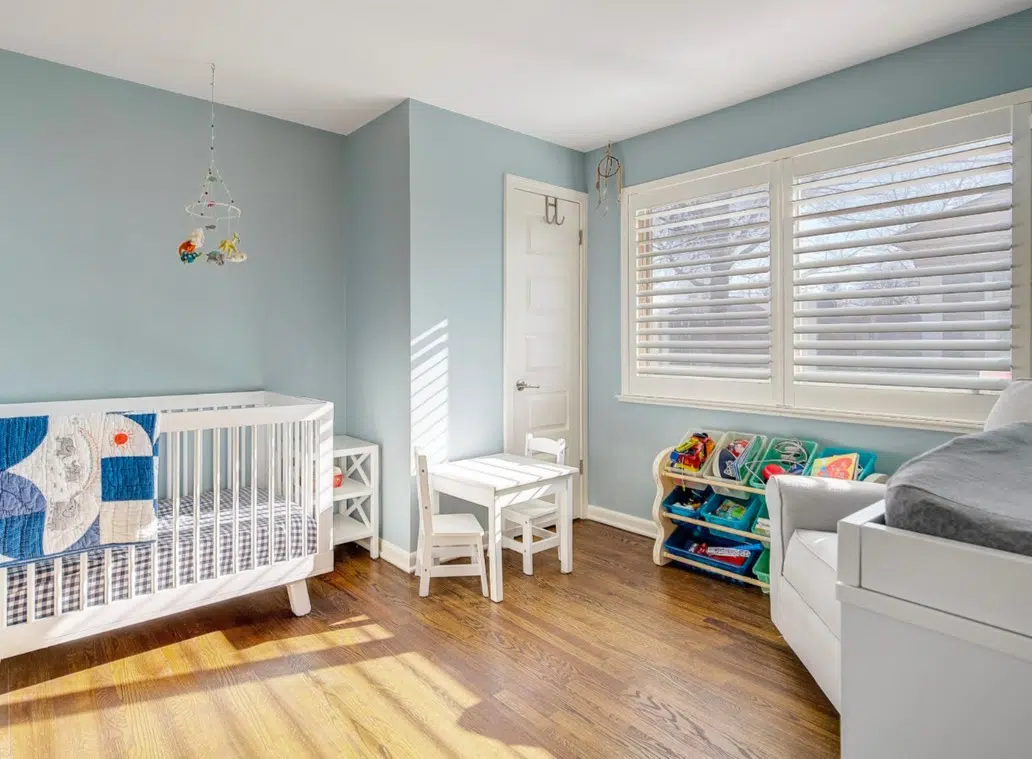 Boy's blue nursery painted with Benjamin Moore Smoke.
