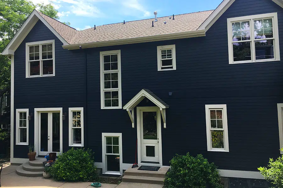 Blue house with white trim and white back door