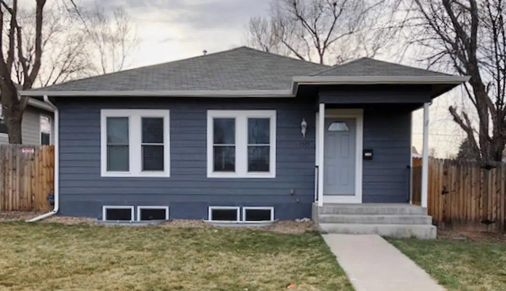 Exterior blue color palette with light gray door and white trim