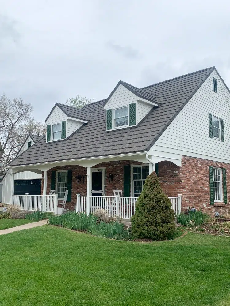 Red brick cottage with SW Greek Villa white paint, SW Courtyard green shutters and SW Tricorn Black front door