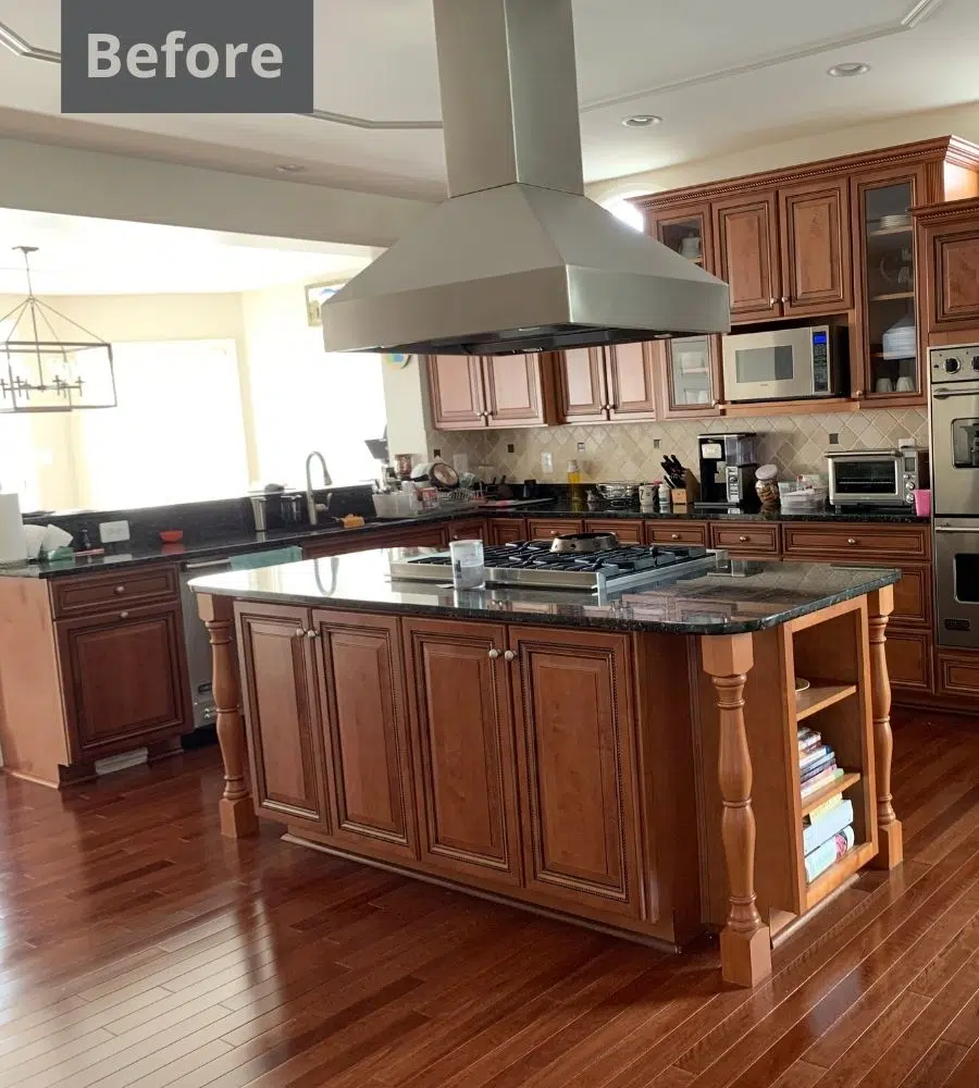 Kitchen with cherry cabinets and dark counters