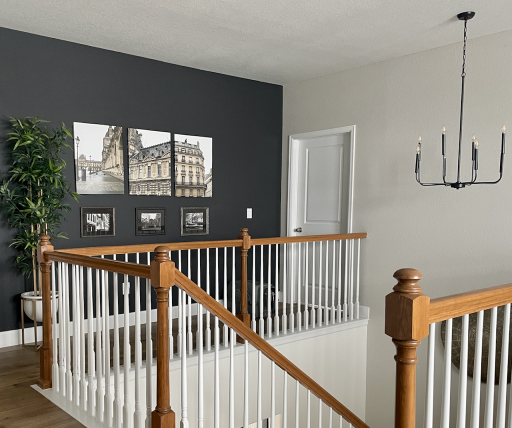 Black Iron Ore accent wall with white trim and SW Agreeable Gray walls