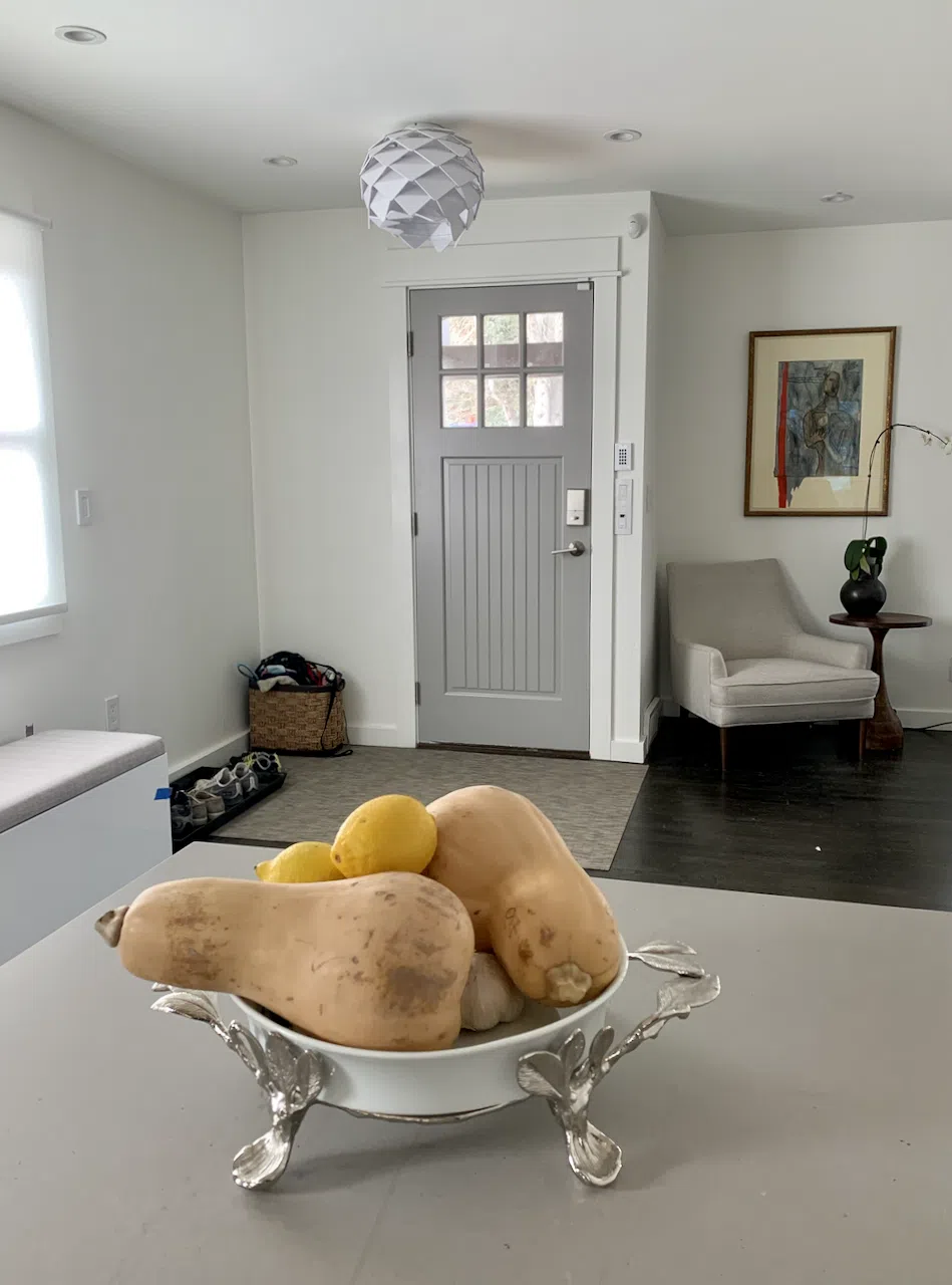 Entry with Benjamin Moore Snowfall White on walls, ceiling and trim