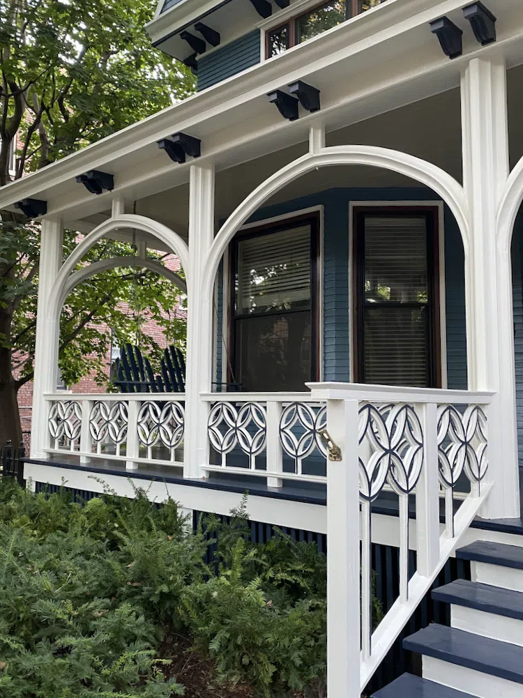 Front Porch of blue Victorian House painted BM THousand Oceans