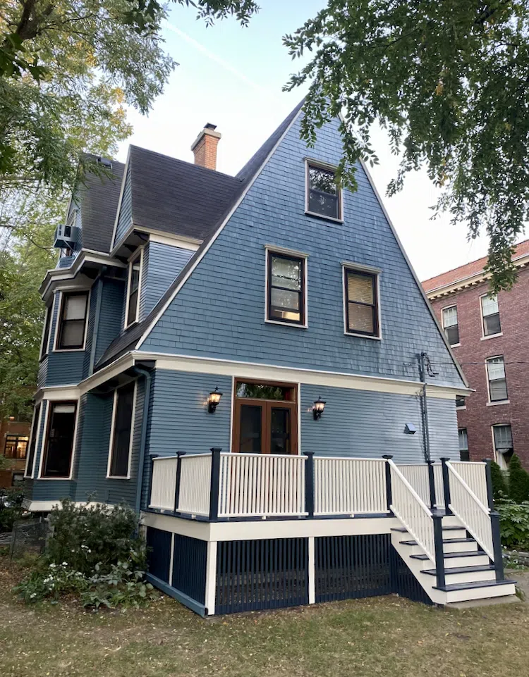 Front Porch of blue Victorian House painted BM THousand Oceans