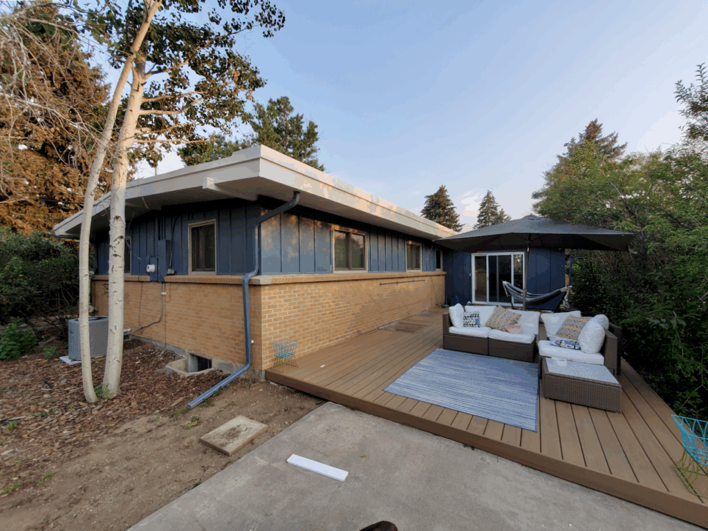 Exterior painted with Granite Peak (like Britannia Blue) with Egret White trim.
