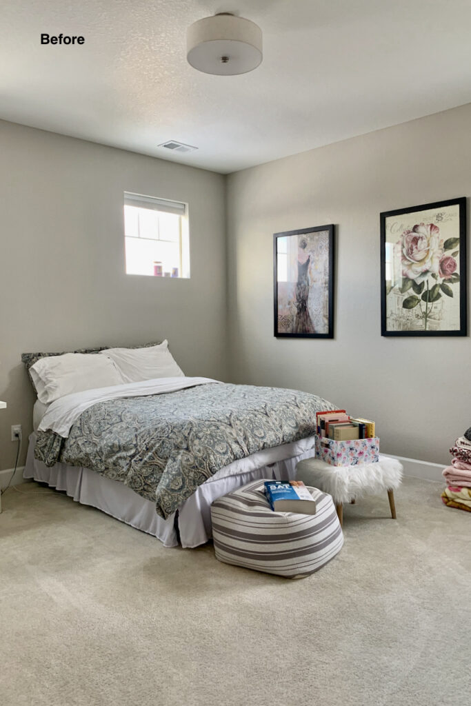 A bedroom with bed and framed art on the walls painted with Agreeable Gray wall paint