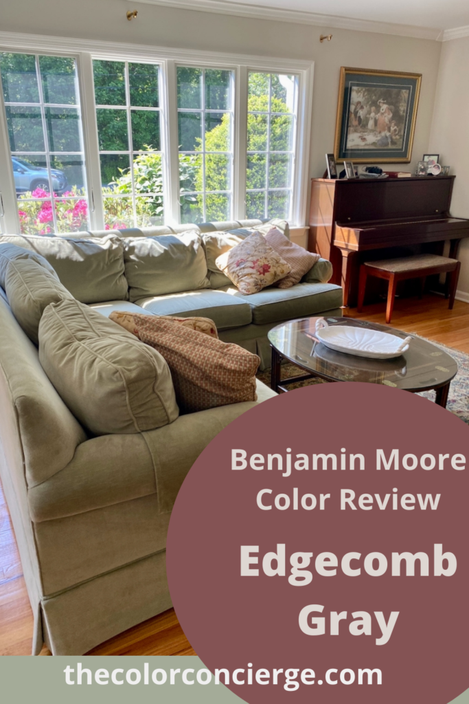 A living room with a large window featured in this Benjamin Moore Edgecomb Gray paint color review