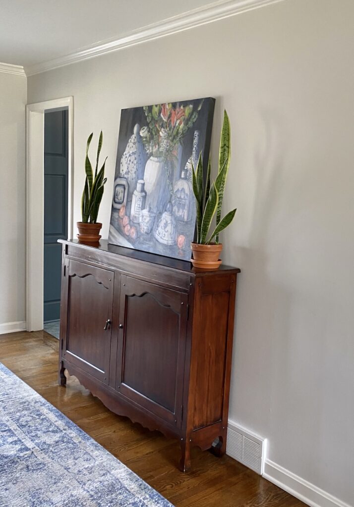 Benjamin Moore Pale Oak Paint is featured in this living room makeover project.