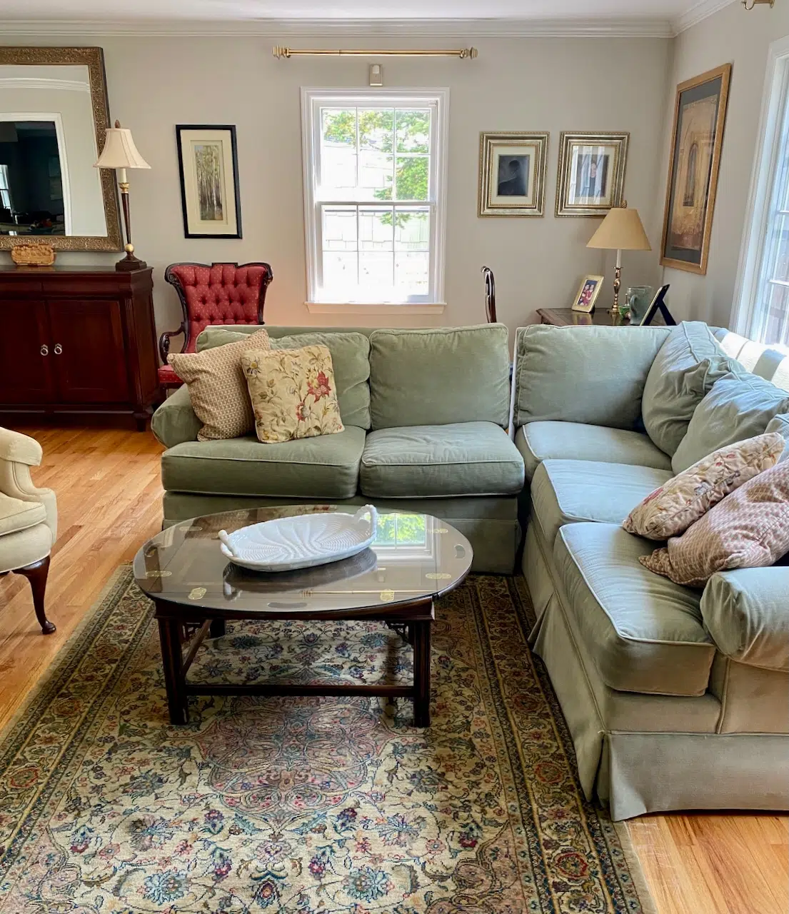 A living room is painted with Benjamin Moore Edgecomb Gray paint.