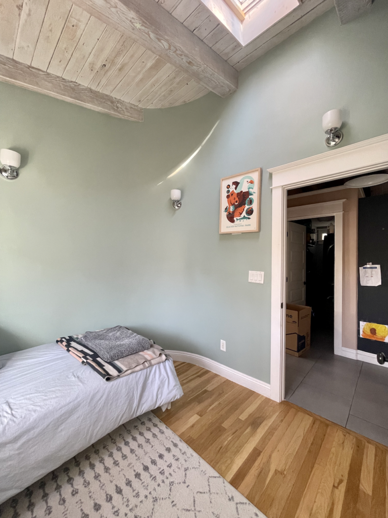 Farrow & Ball Green Blue walls in a young boy's bedroom