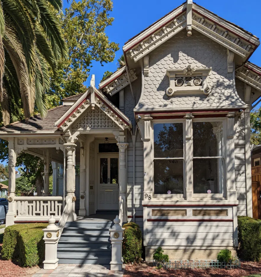 A before photo of a Victorian home color palette