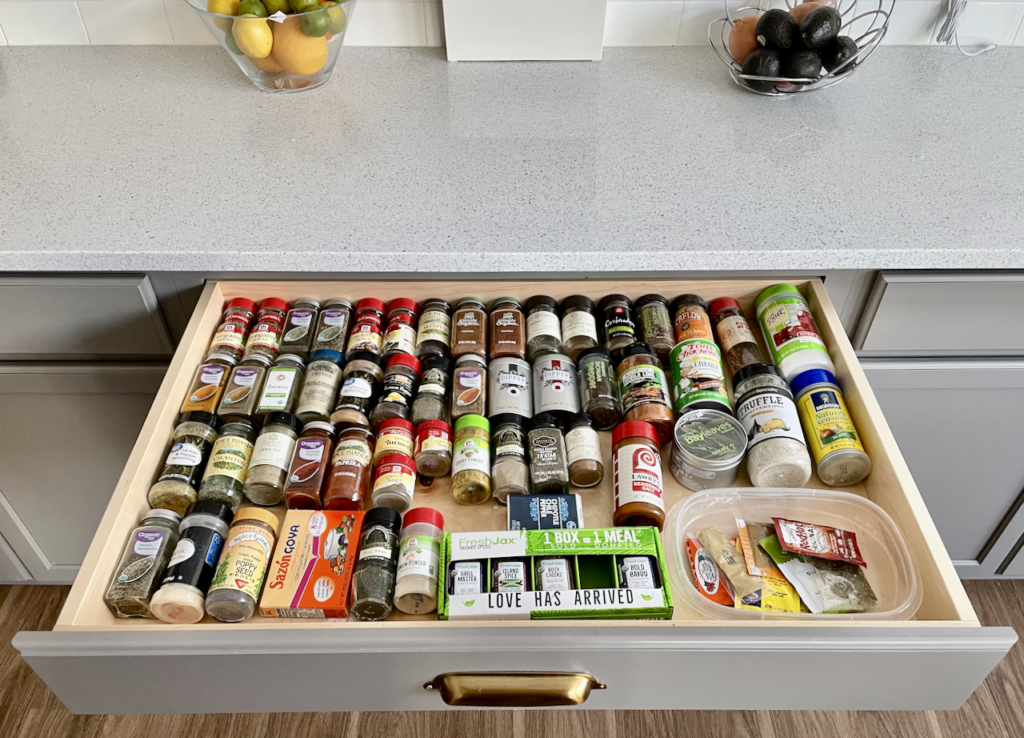 Lay-flat spice rack in a drawer