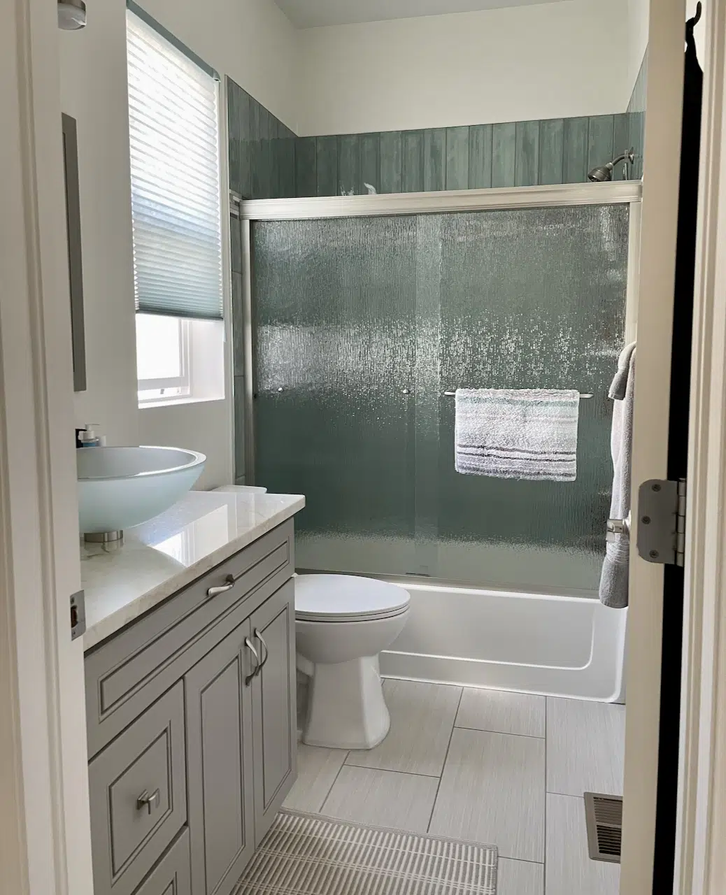 A SW Greek Villa bathroom with blue bathroom tiles