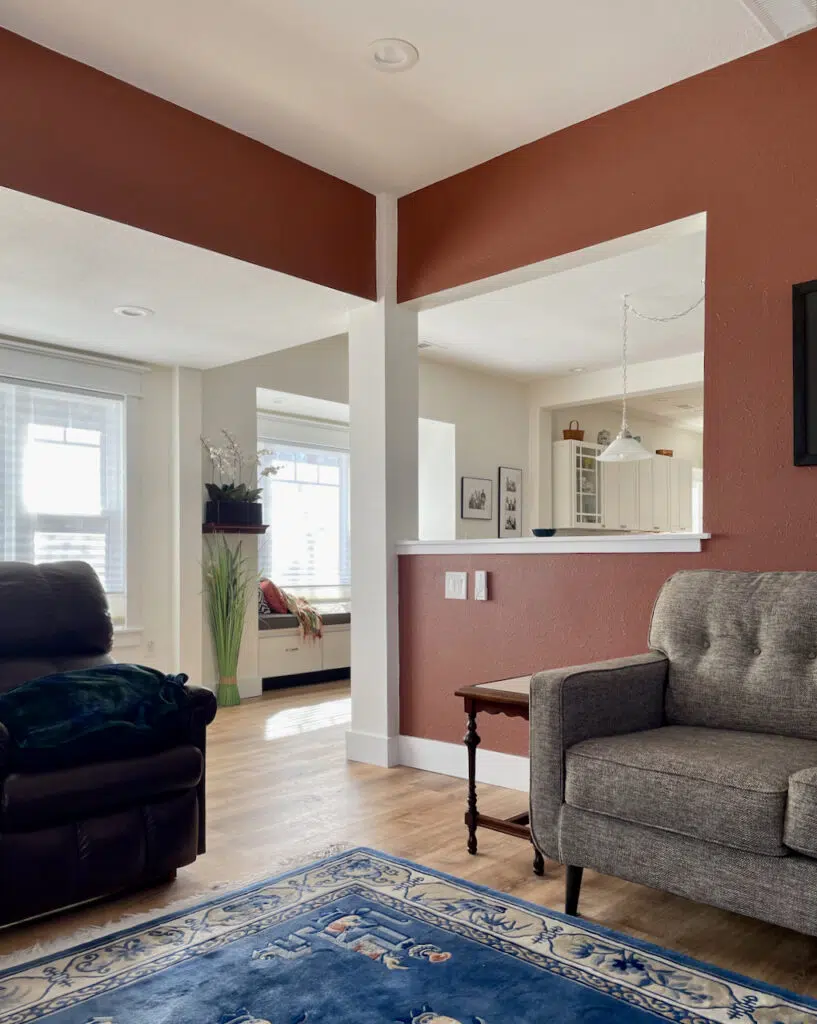 A living room painted with Benjamin Moore Giant Sequoia paint is an accent in our BM Simply White color palette for the whole house.