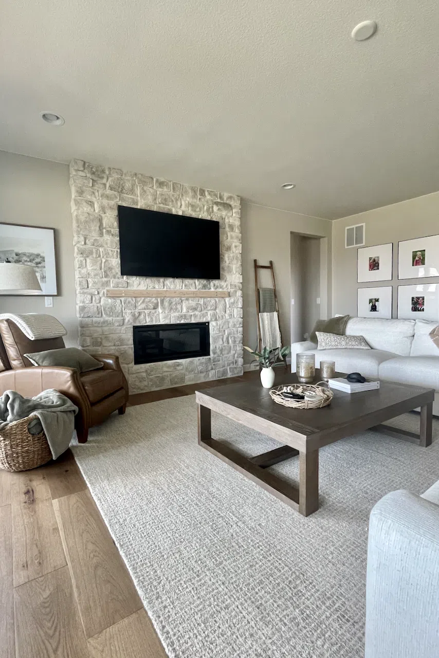 A living room painted with Sherwin-Williams Accessible Beige paint.