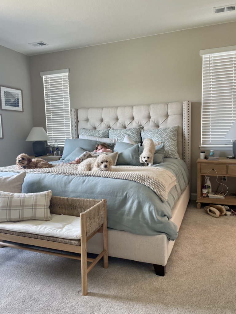 A master bedroom painted with SW Accessible Beige paint.