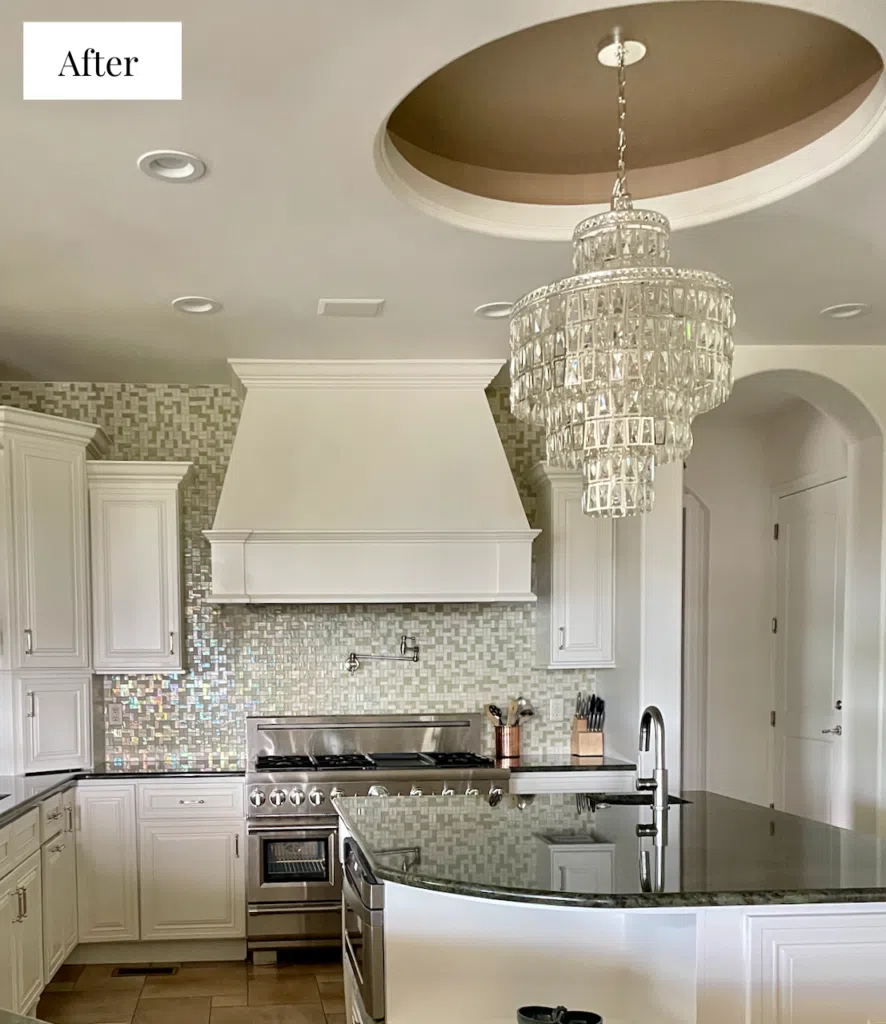 A kitchen painted with Swiss Coffee cabinets and walls. 