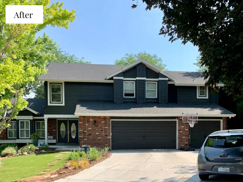 A home with SW Iron Ore paint with red brick.