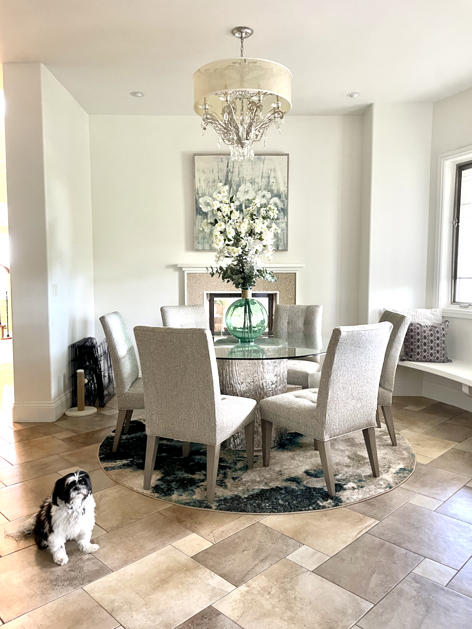 A dining room painted with Benjamin Moore Swiss Coffee paint.