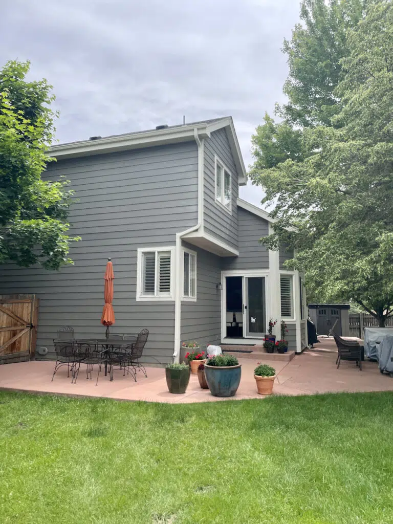 A home is painted with Benjamin Moore Chelsea Gray exterior paint. 