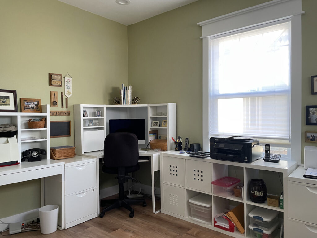 An office is painted with BM Fernwood Green paint. 