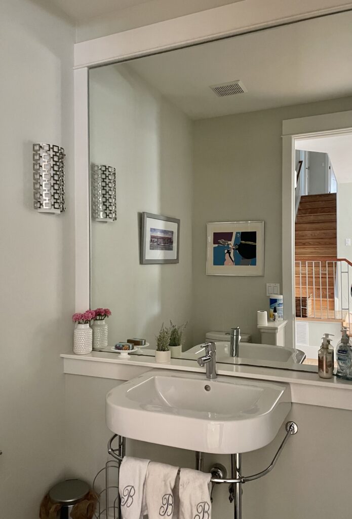 A powder room is painted with Benjamin Moore Titanium paint.