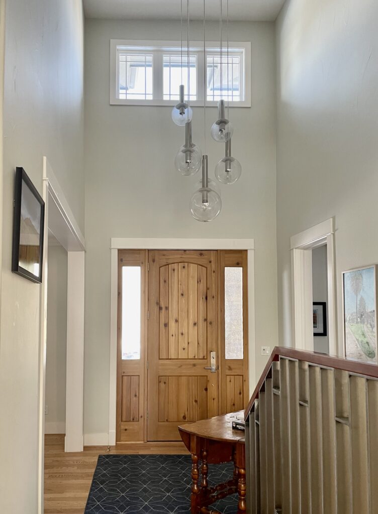 An entryway is painted with Benjamin Moore Titanium paint. 