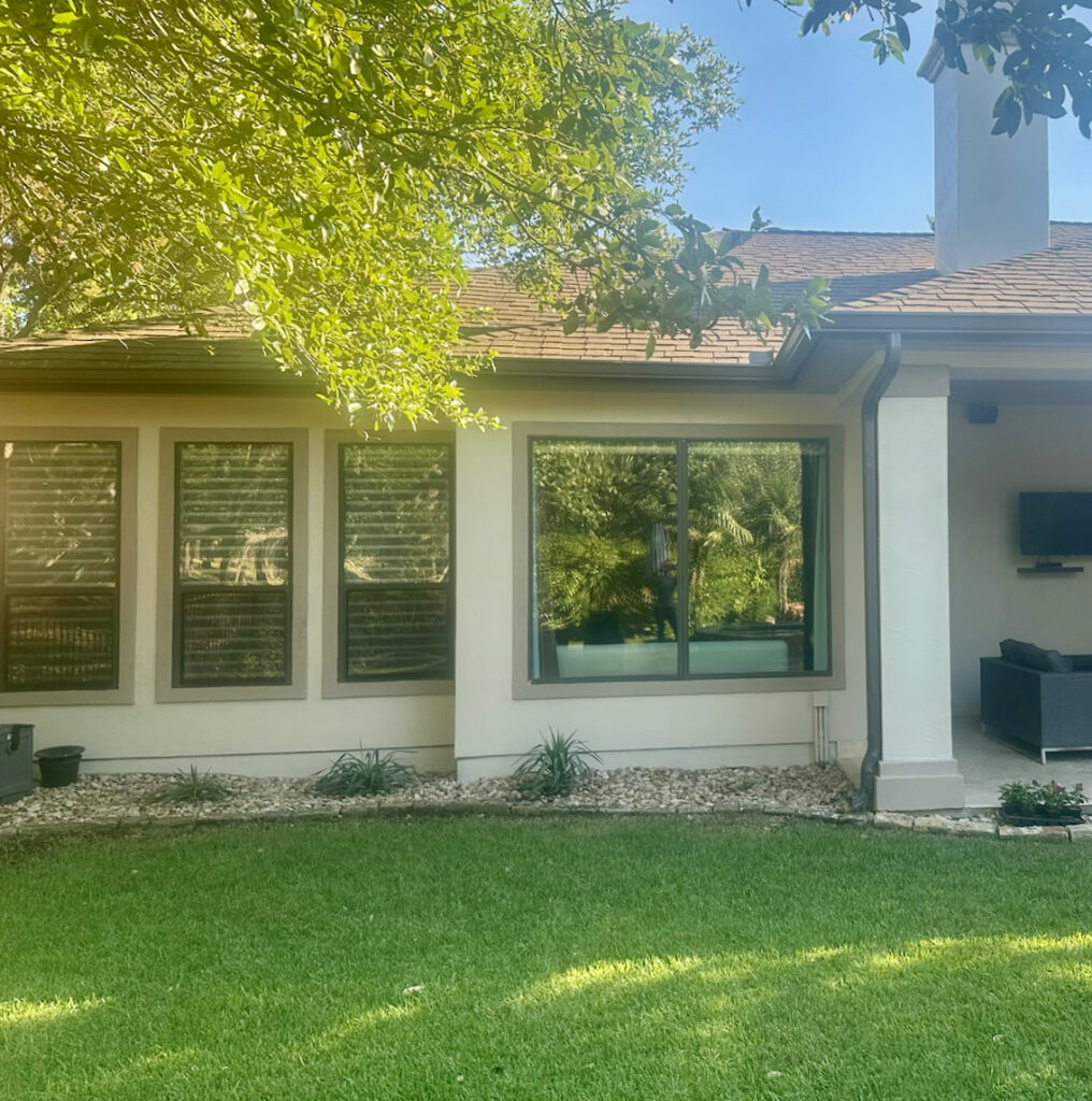 A home features SW Tony Taupe exterior trim with SW Accessible Beige stucco.