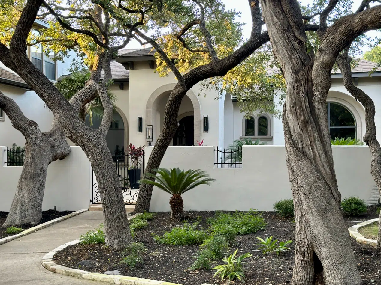 A home features a Sherwin-Williams Accessible Beige exterior