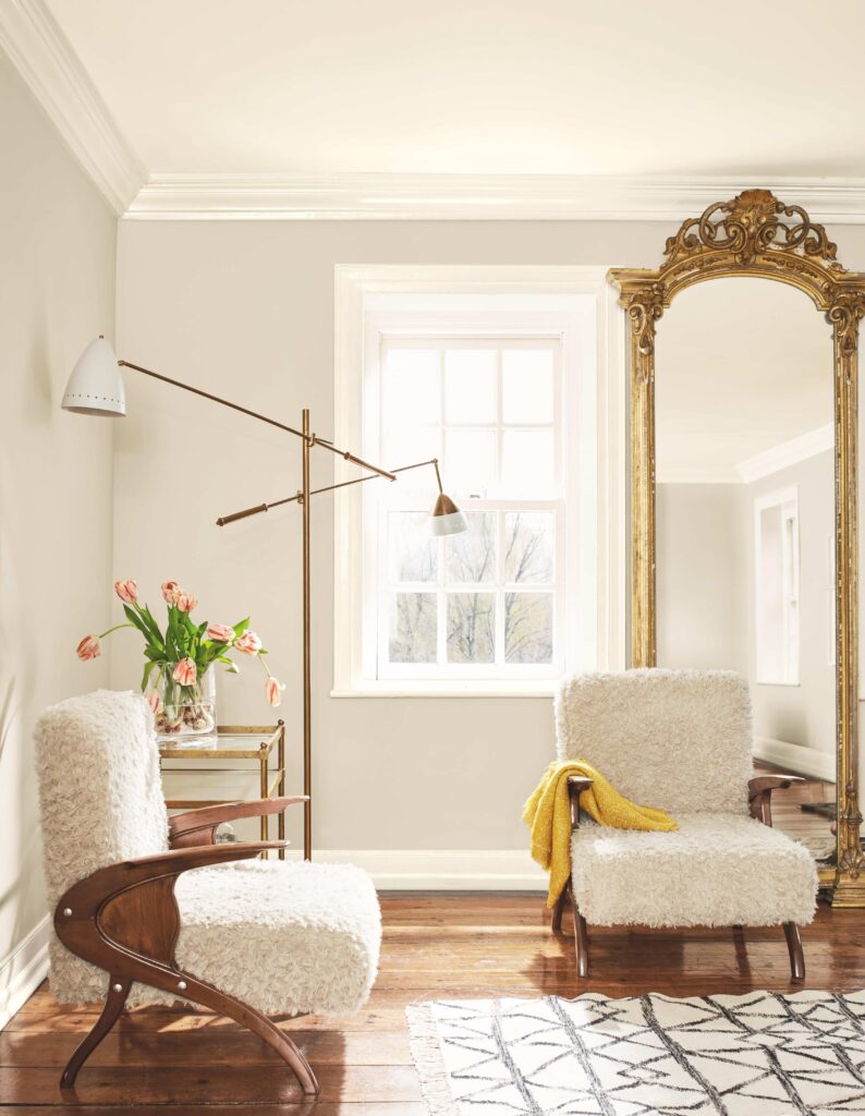 A living room is painted with Benjamin Moore Sea Salt. 