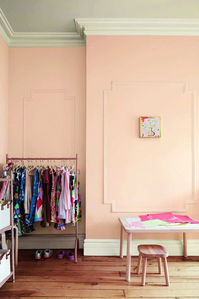 A little girl's room is painted with BM Tissue Pink paint. 