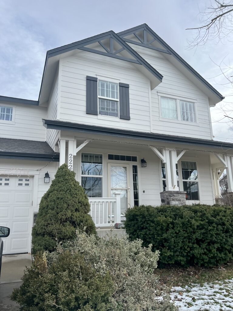 A home features Sherwin-Williams Egret White siding. 