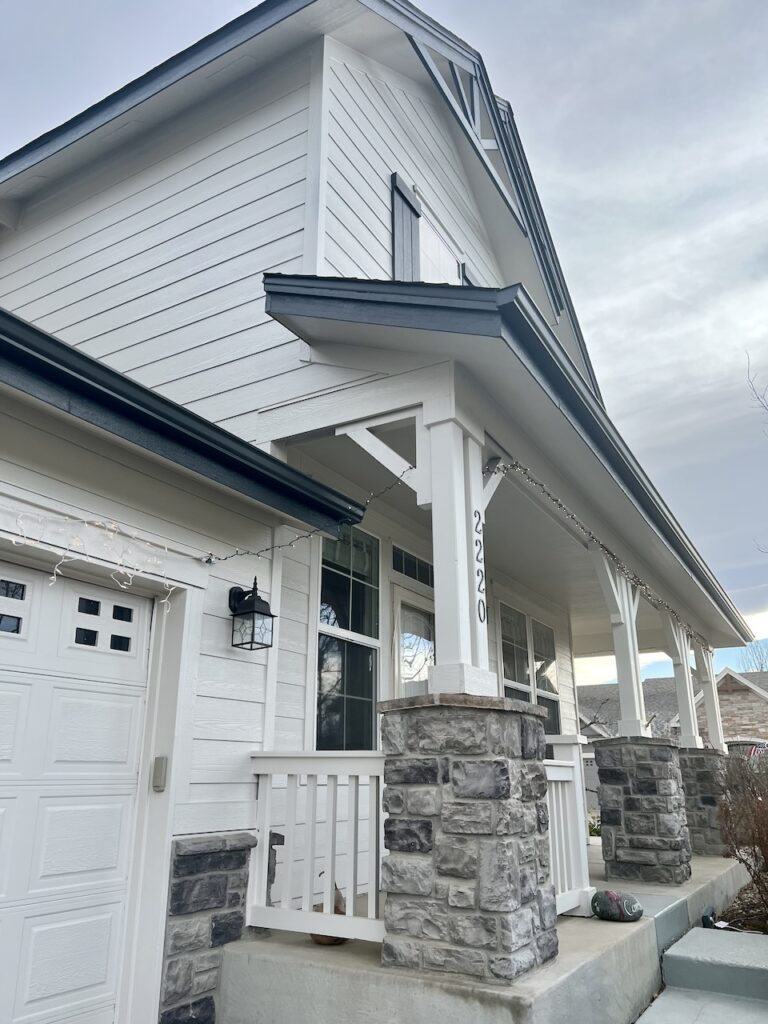 A home features Sherwin-Williams Egret White siding. 