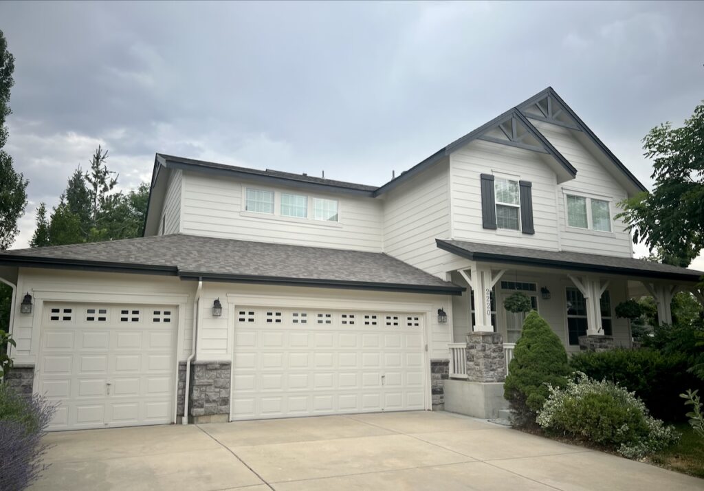 A home features Sherwin-Williams Egret White siding. 