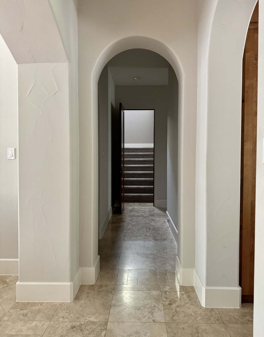 A hallway painted with Sherwin-Williams Egret White