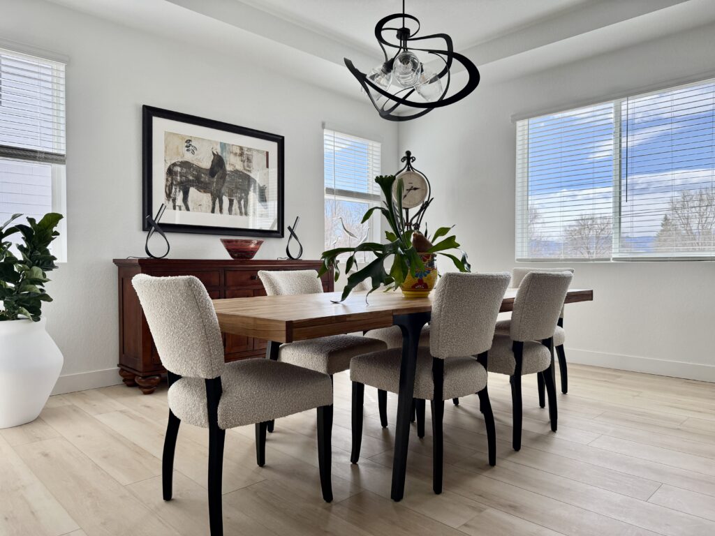 A dining room painted with SW Extra White walls. 
