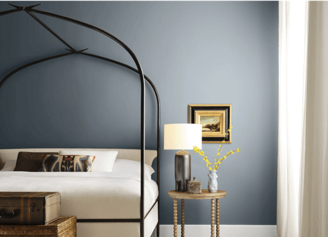 A bedroom painted with Sherwin-Williams Rain Cloud paint, part of the Sherwin-Williams 2025 Color of the Year Capsule