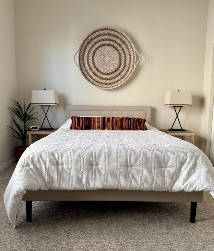 A bedroom is painted with BM Maritime White paint. 