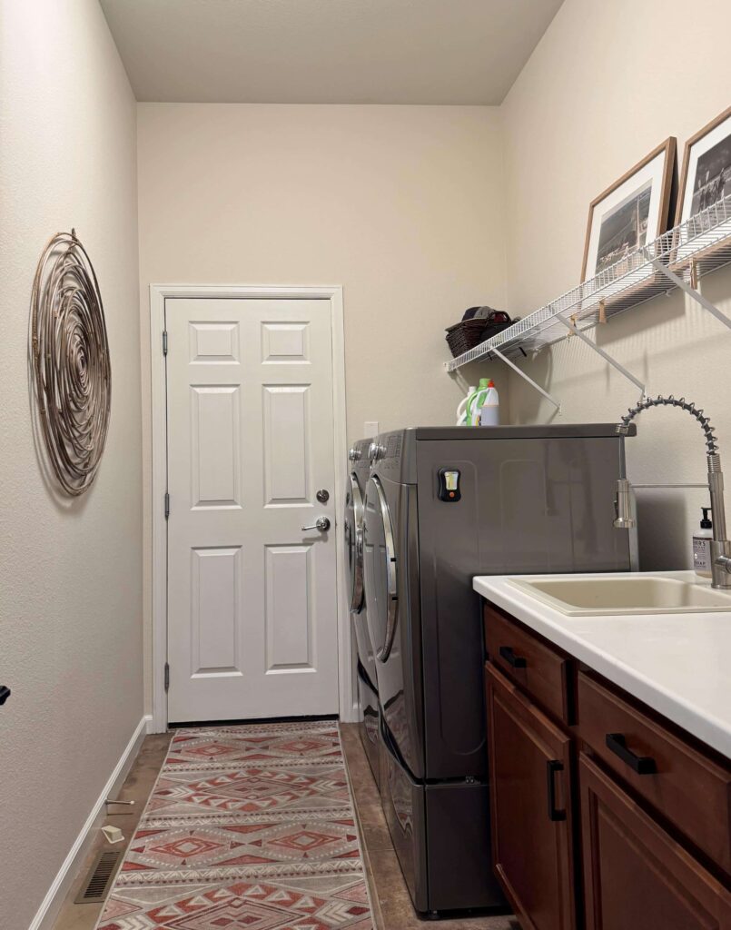 A laundry room is painted with BM Maritime White walls.