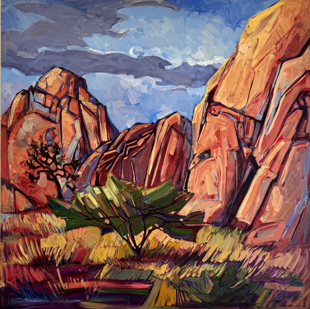 A painting with orange desert mountains, green trees and blue sky was the inspiration for our SW Alabaster color palette.