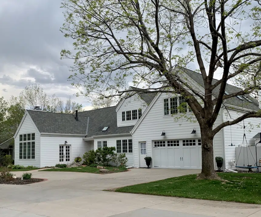 A home features a SW Snowbound exterior paint color palette.